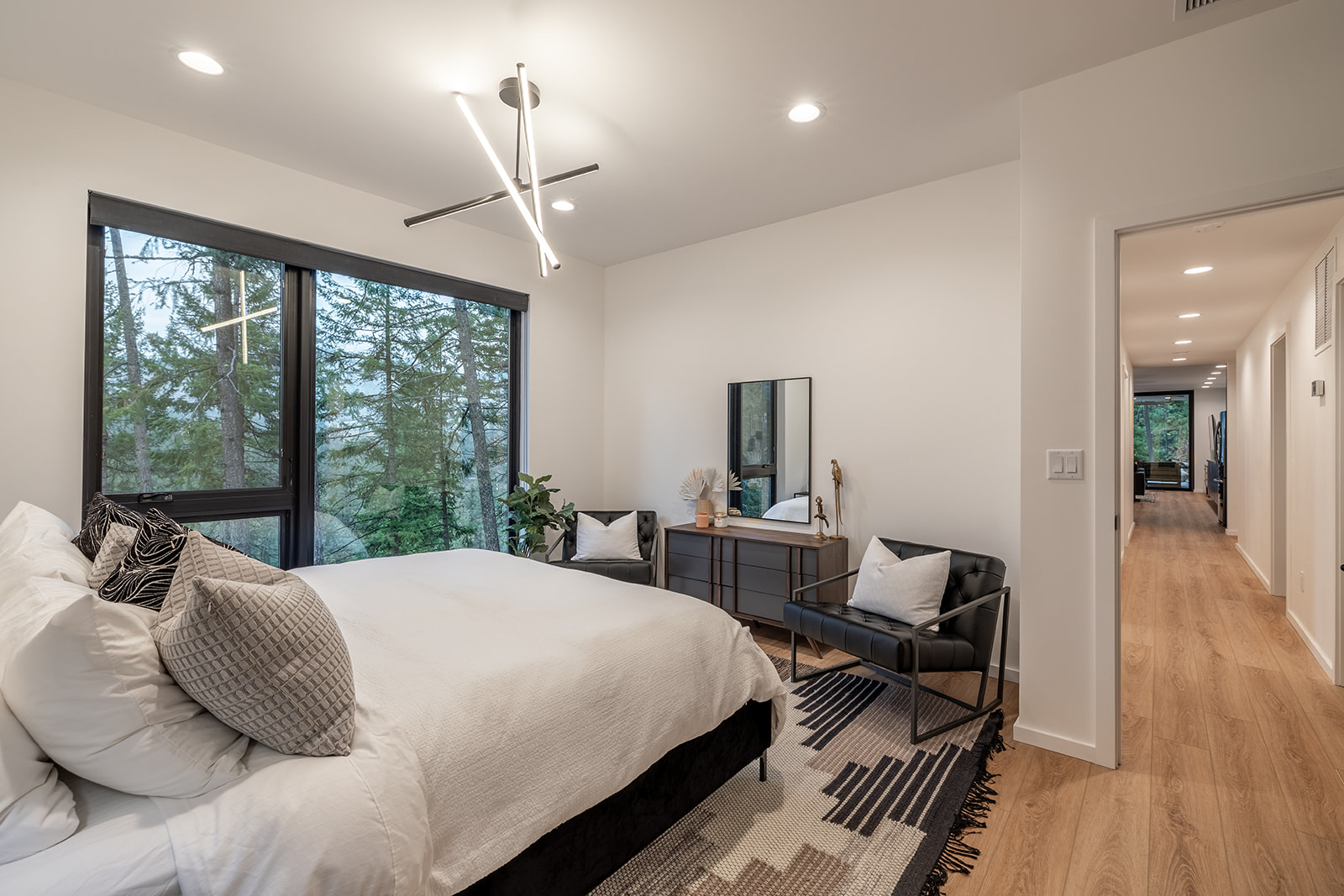 King bedroom with forest views